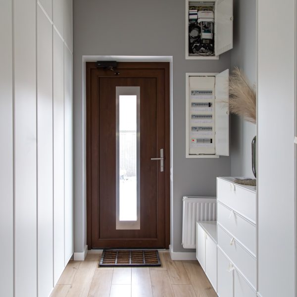 Corridor interior with an entrance door in a private house.